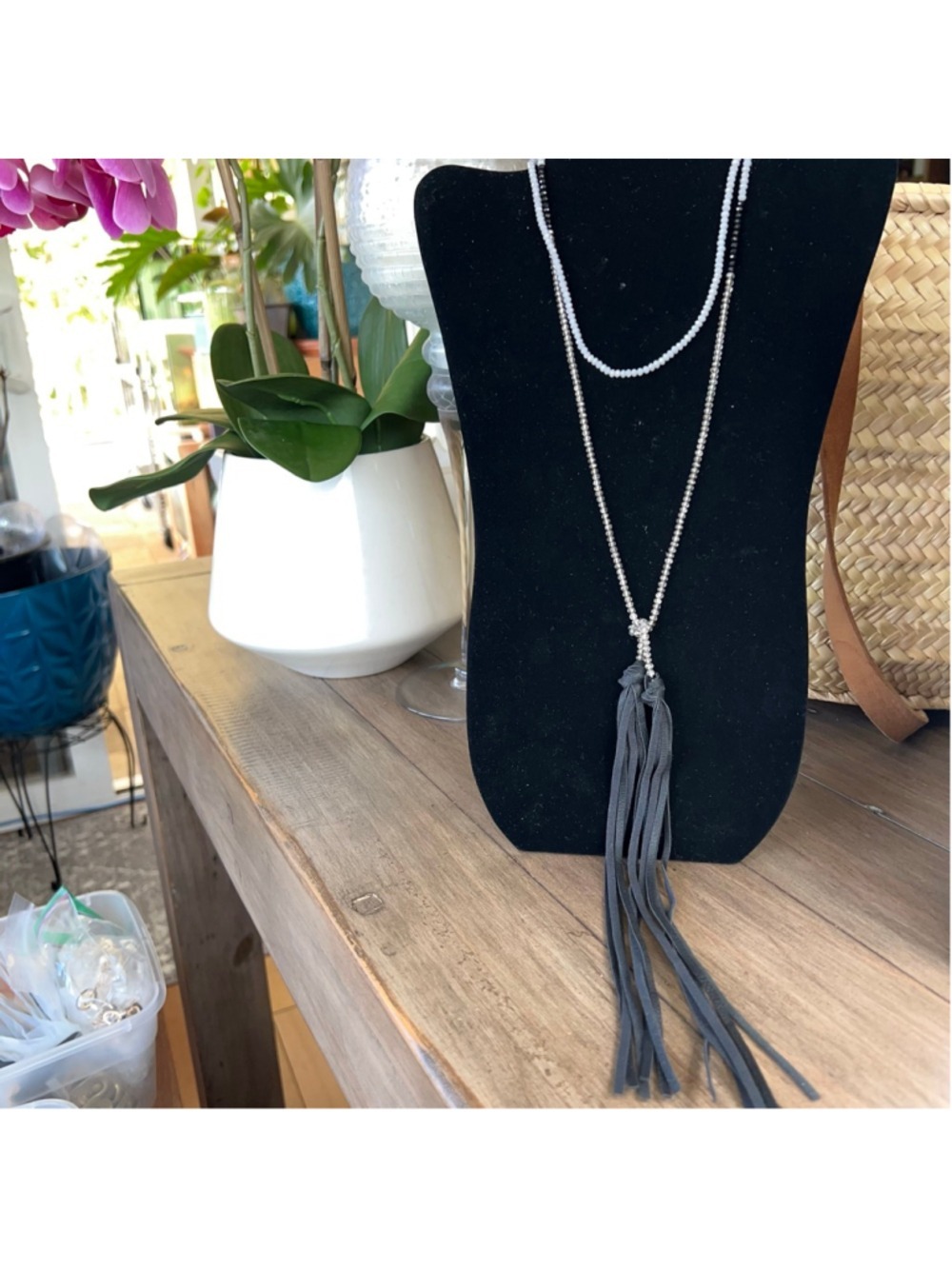 Express beaded necklace with metal tassel